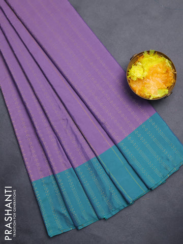 Arani semi silk saree lavender and teal green with allover silver & copper zari weaves and zari woven border