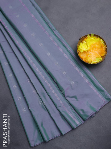 Arani semi silk saree dual shade of greenish purple with silver zari woven buttas in borderless style