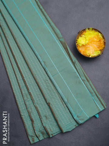 Arani semi silk saree dual shade of green with allover silver zari weaves in borderless style