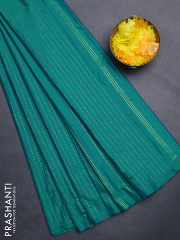 Arani semi silk saree teal blue shade with allover zari weaves in borderless style