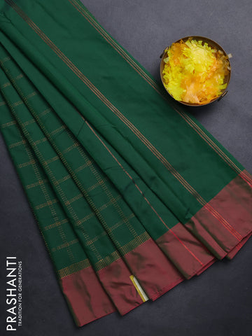 Arani semi silk saree green and dual shade of pink with allover copper zari checked pattern and copper zari woven simple border