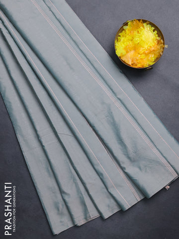 Arani semi silk saree dual shade of greyish green with allover silver zari weaves in borderless style