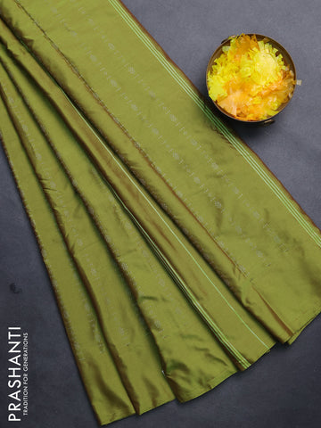 Arani semi silk saree light green with allover silver zari weaves in borderless style