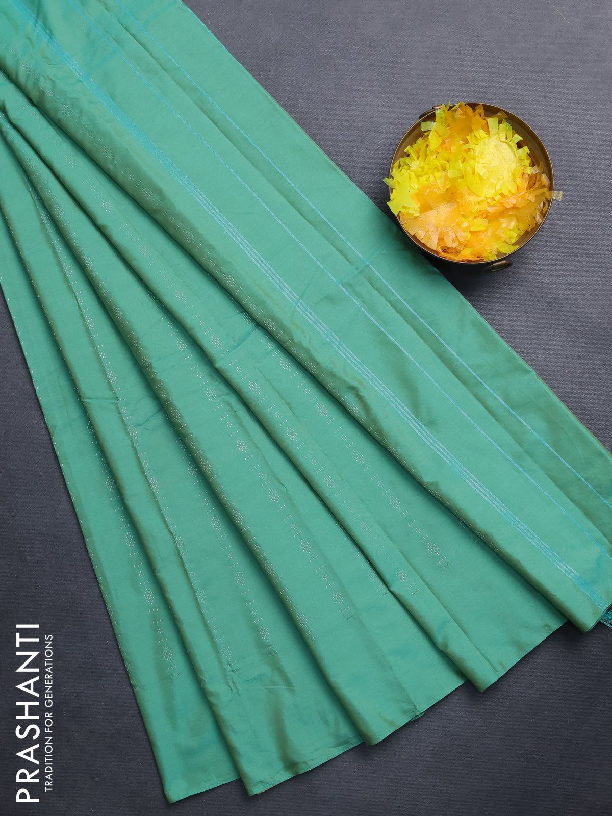 Arani semi silk saree teal green with allover silver zari weaves in borderless style