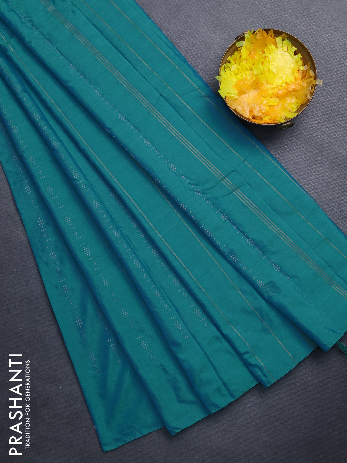 Arani semi silk saree teal blue with allover copper zari weaves in borderless style