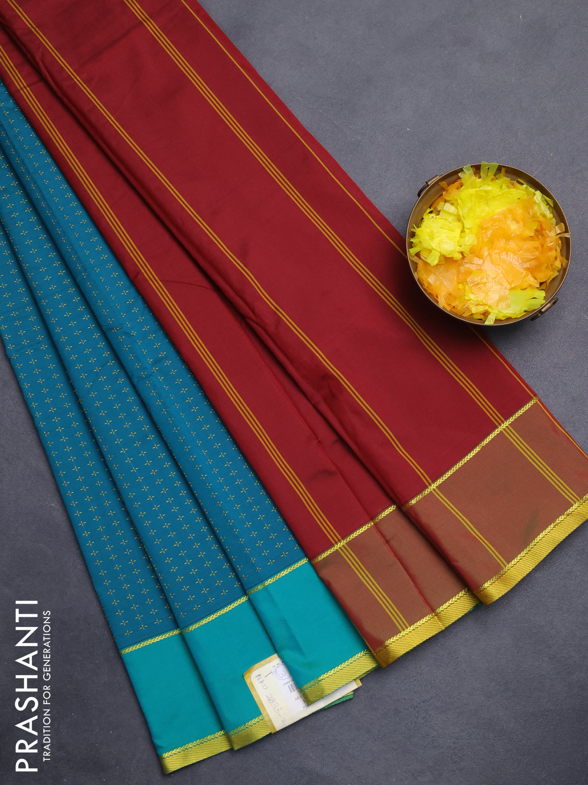Arani semi silk saree teal green and dual shade of maroonish green with allover thread weaves and rettapet zari woven border`
