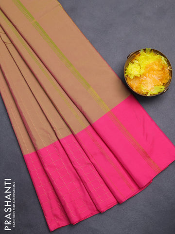 Arani semi silk saree dual shade of green and pink with allover copper zari weaves and zari checked border