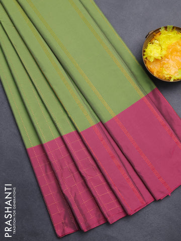 Arani semi silk saree green and magenta pink with allover copper zari weaves and zari checked border