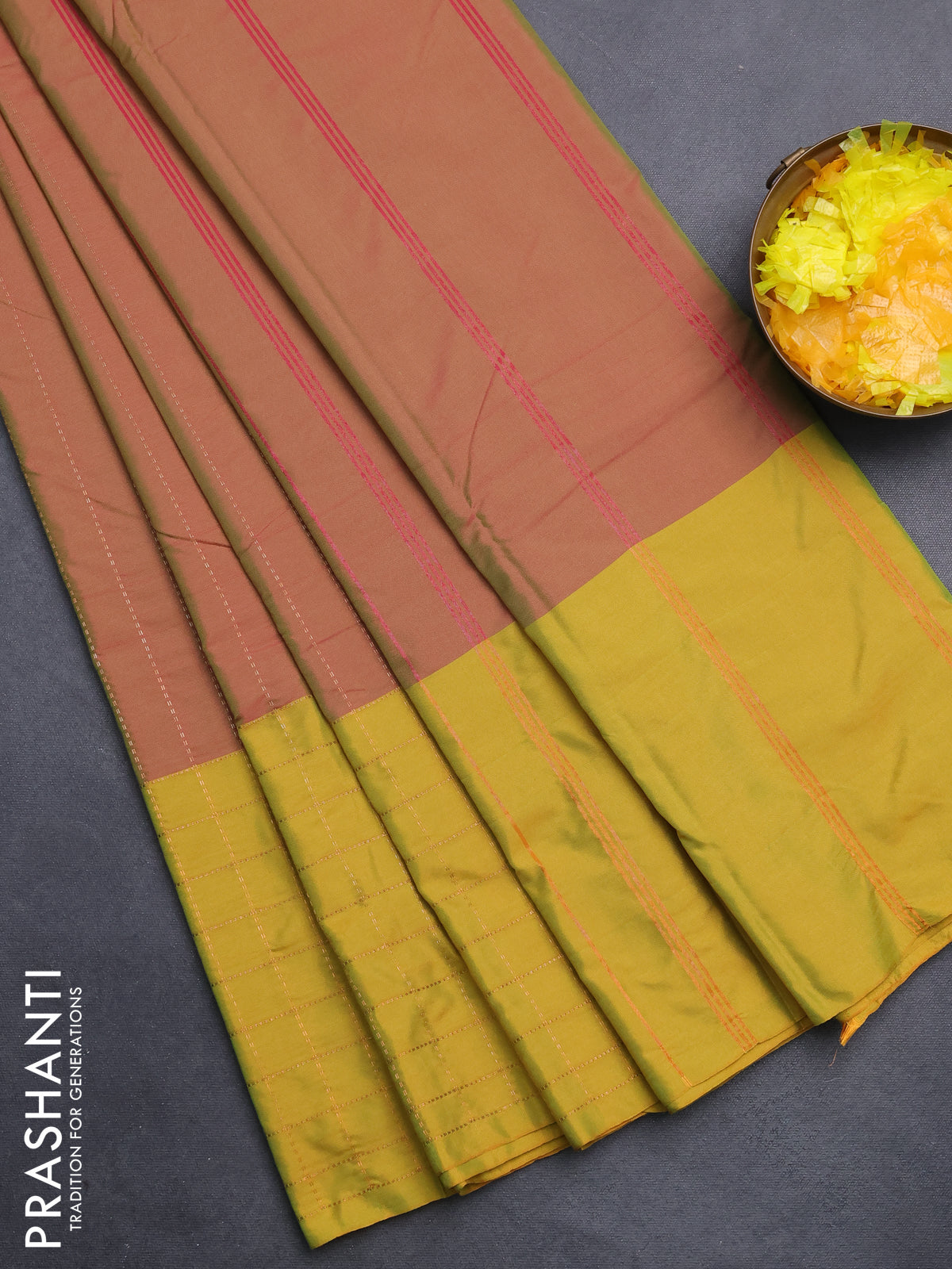 Arani semi silk saree dual shade of pinkish green and lime yellow with allover copper zari weaves and zari checked border