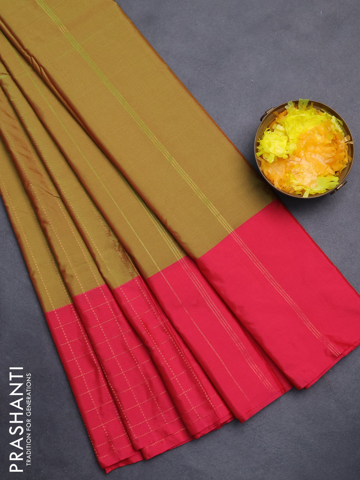 Arani semi silk saree dual shade of green and pink with allover copper zari weaves and zari checked border