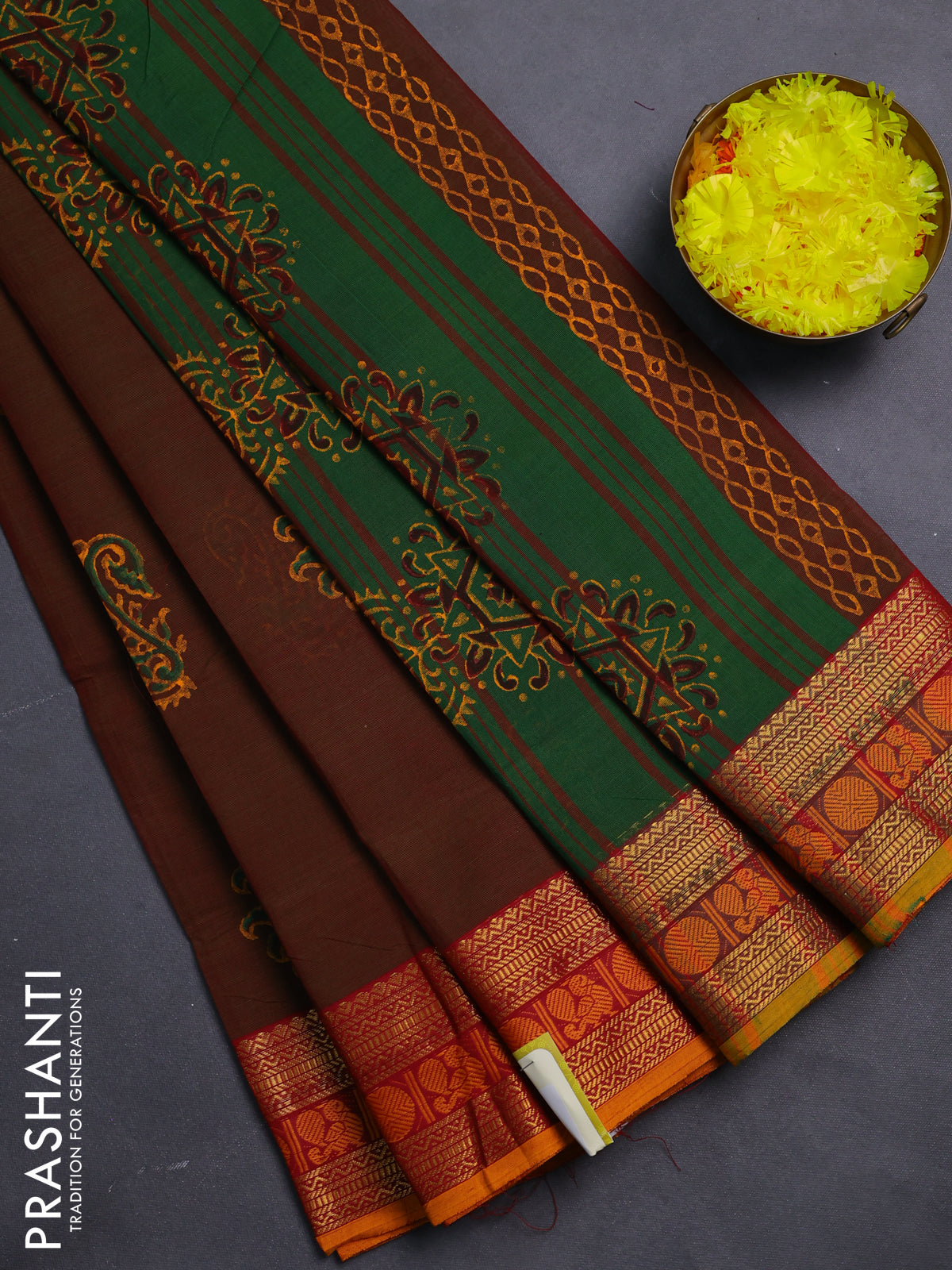 Chettinad cotton saree dual shade of greenish maroon and dark mustard with butta prints and zari woven border