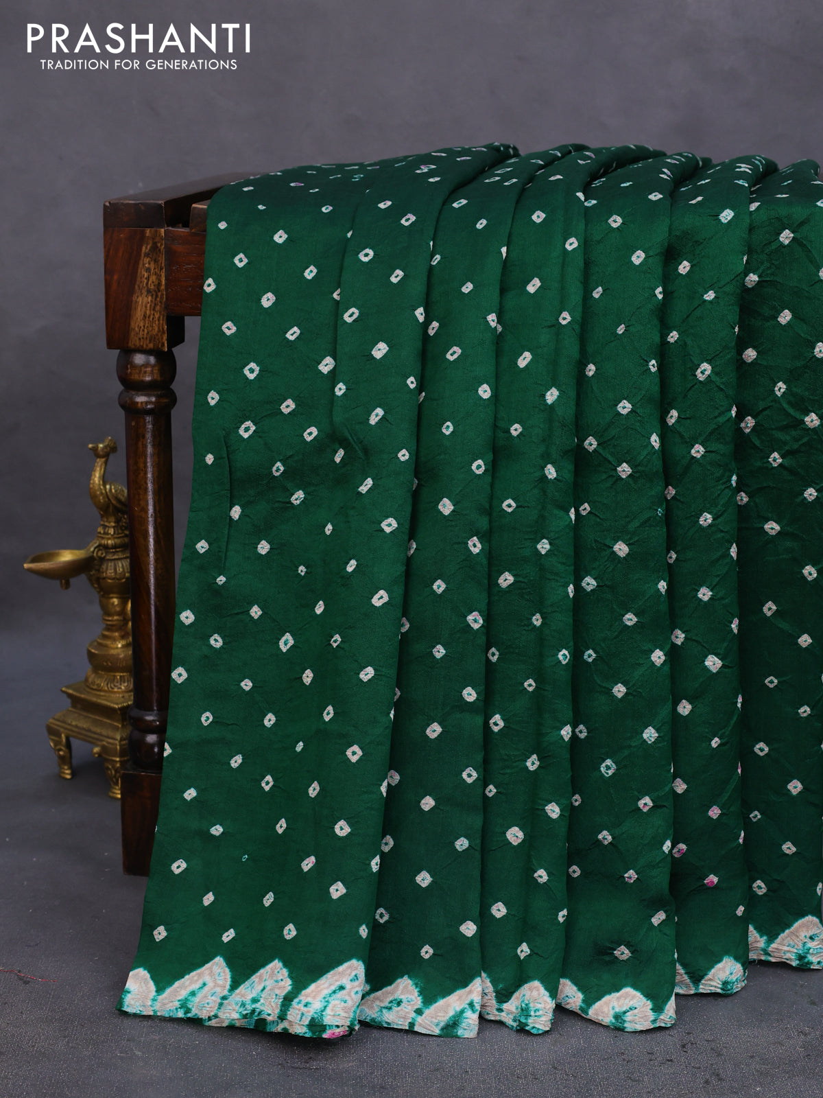 Chiniya silk saree green with allover bandhani prints