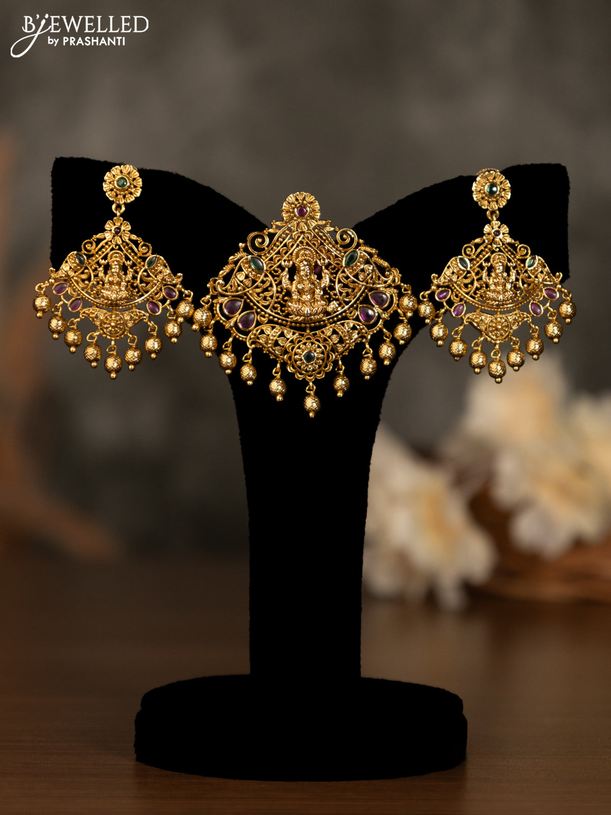 Antique pendant set lakshmi design with kemp stones and golden beads hanging