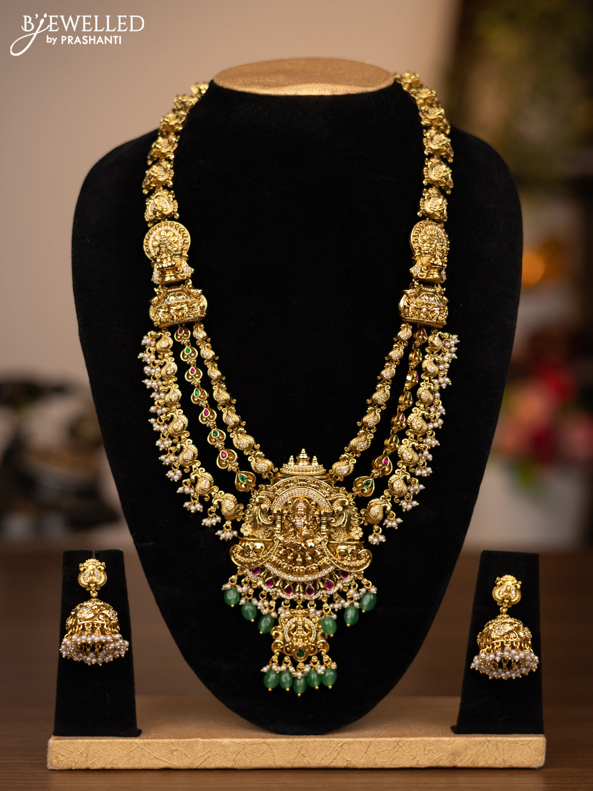 Antique triple layer haaram lakshmi design with jadau stones and green beads hanging