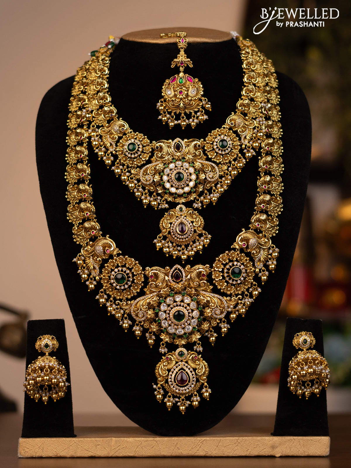 Antique combo set peacock design with jadau kundan stones and pearl & golden beads hanging