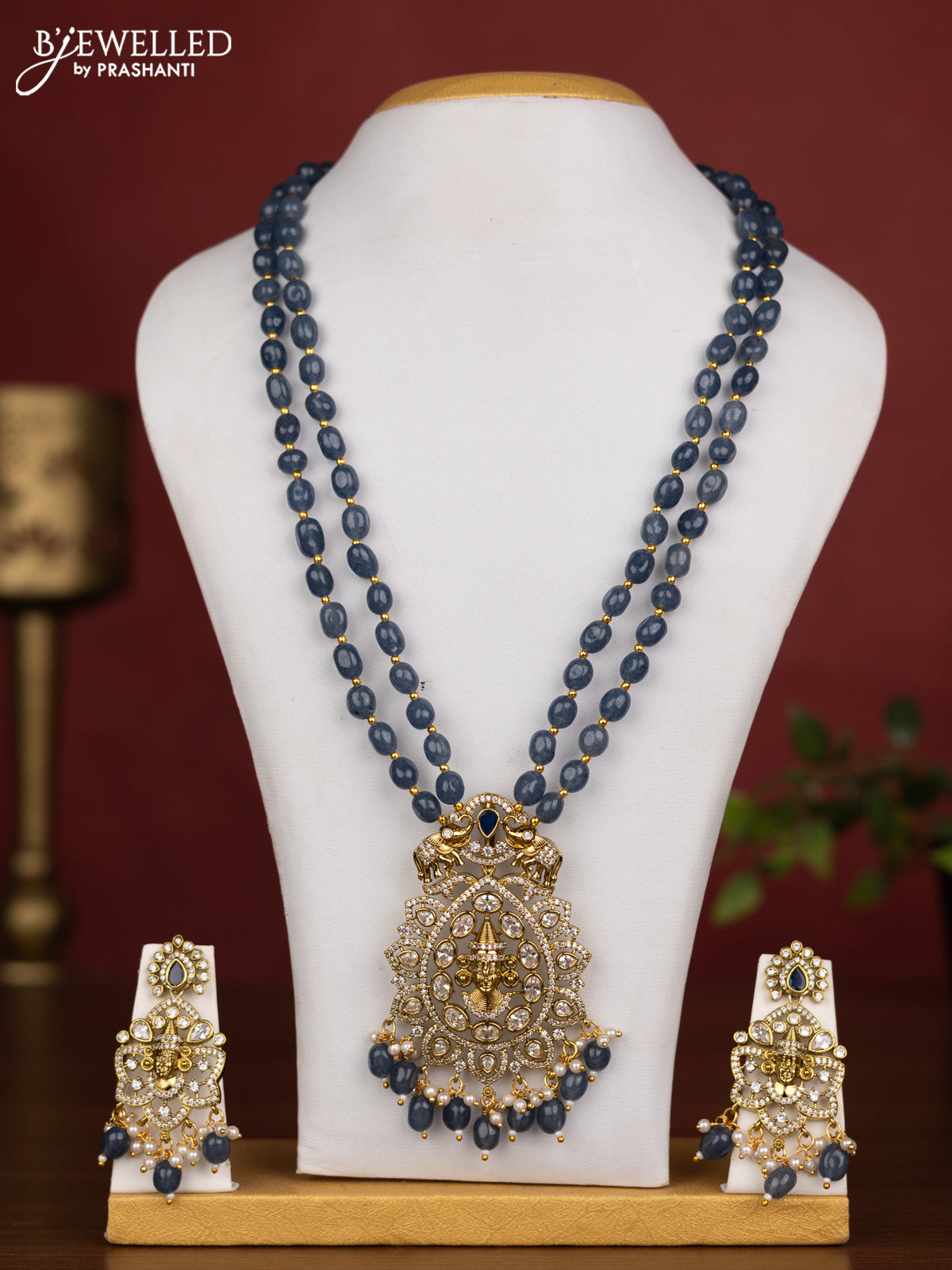 Beaded double layer blue necklace tiruapti balaji pendant with sapphire & cz stones and pearl & beads hanging in victorian finish