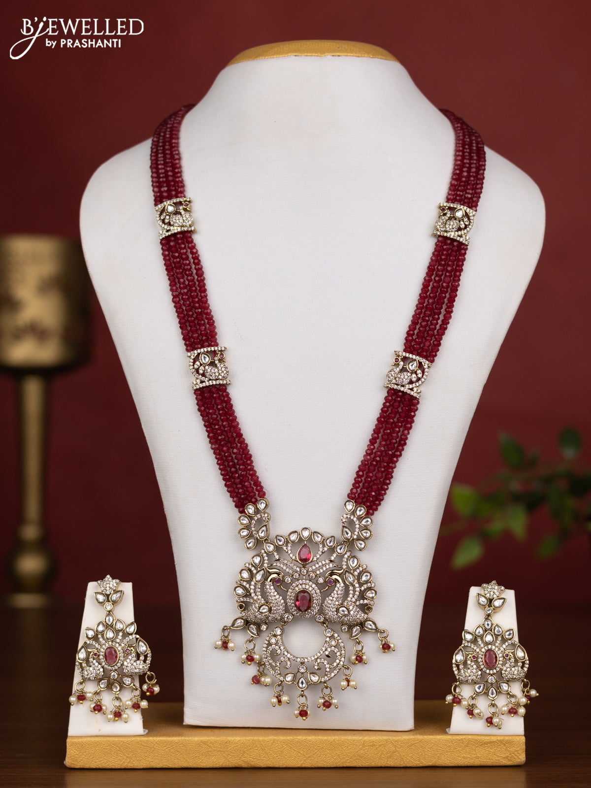 Beaded multilayer maroon necklace peacock design with ruby kundan & cz stones and pearl & beads hanging in victorian finish