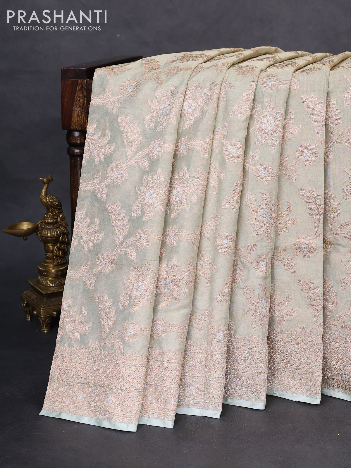 Banarasi tissue silk saree pastel green with allover zari woven brocade weaves and zari woven border