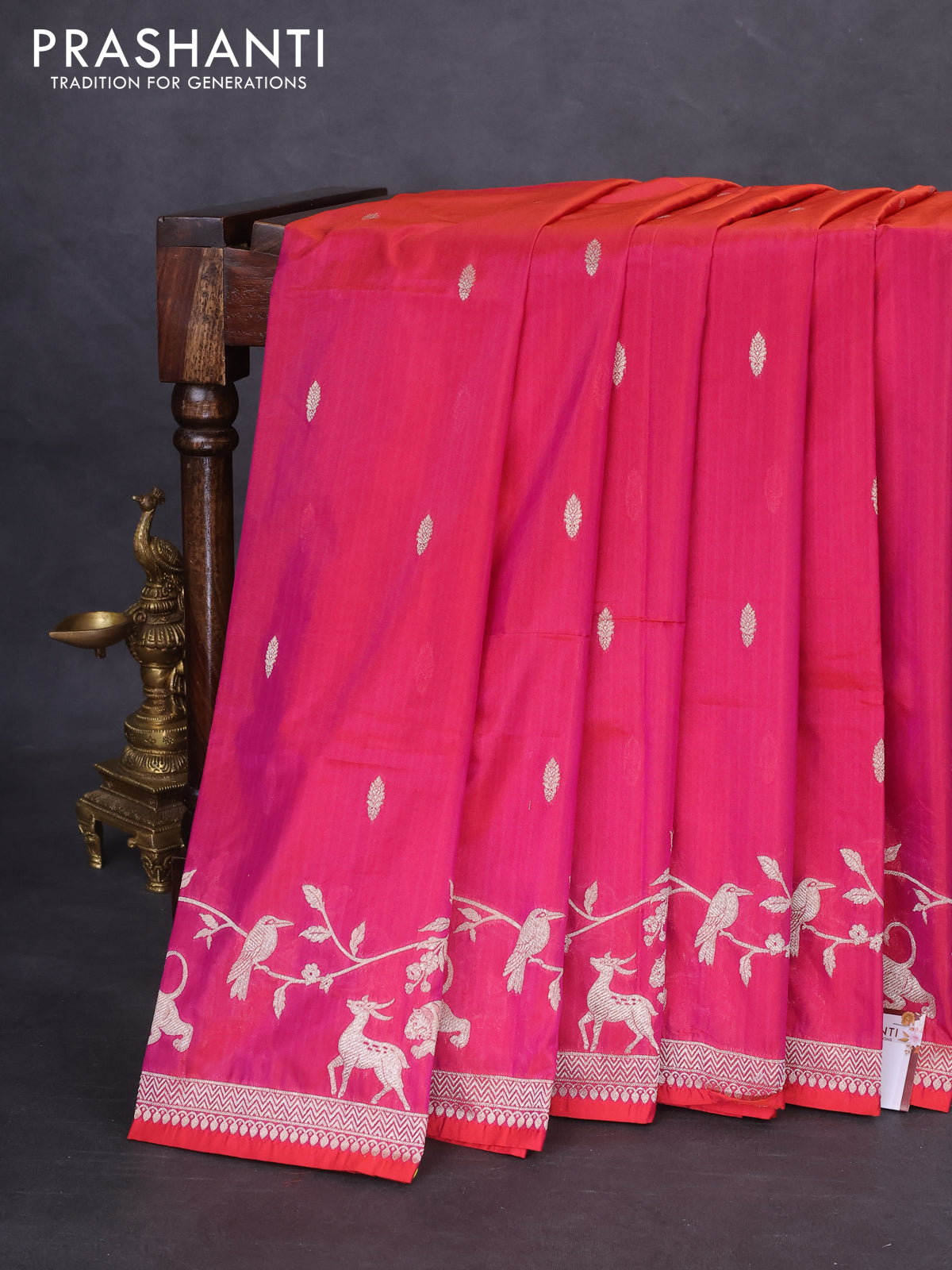 Banarasi semi katan silk saree dual shade of reddish pink with allover zari woven buttas and rich zari woven border