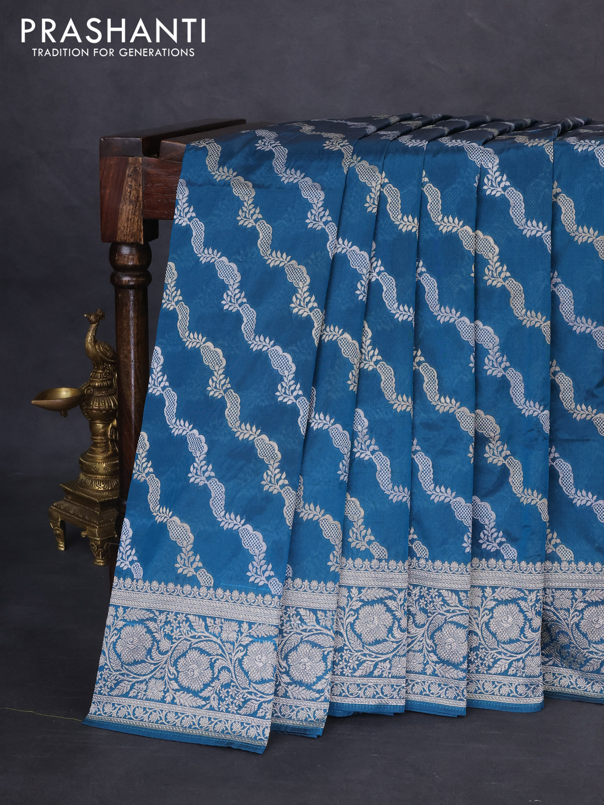 Banarasi semi katan silk saree peacock blue with allover silver & gold zari weaves and floral zari woven border