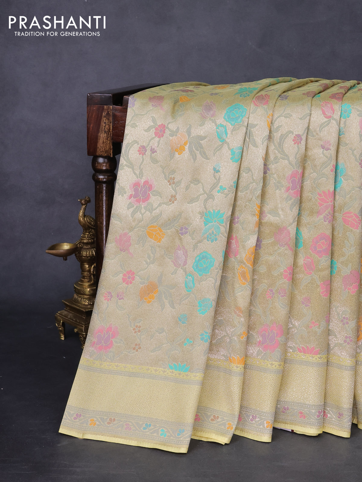 Banarasi tissue silk saree pale yellow with allover thread woven floral weaves and silver zari woven border