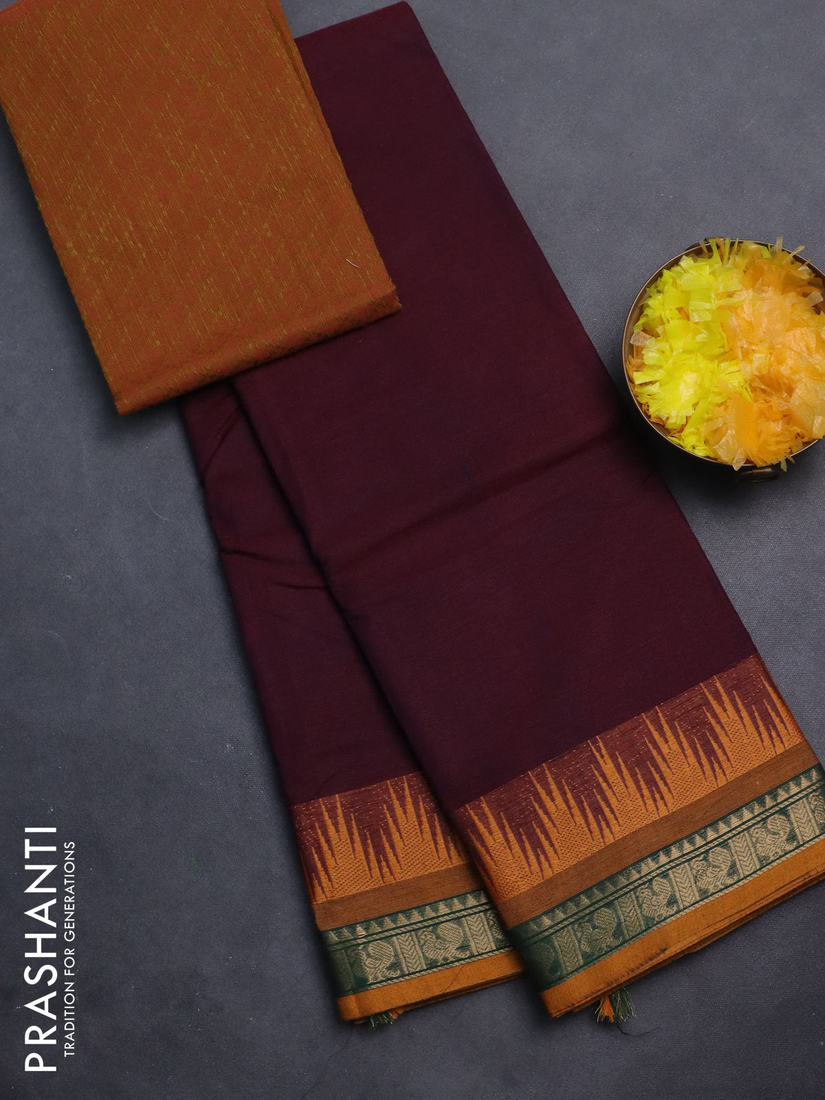 Chettinad cotton saree deep maroon and mustard yellow with plain body and temple design zari woven bordrer