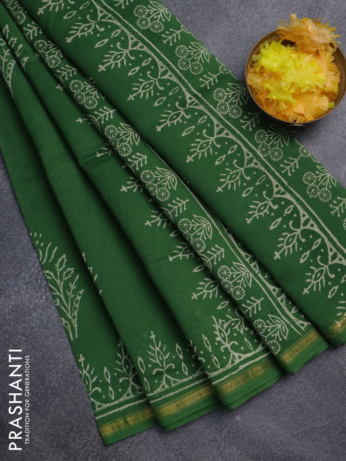Chanderi bagru saree green with floral butta prints and small zari woven border