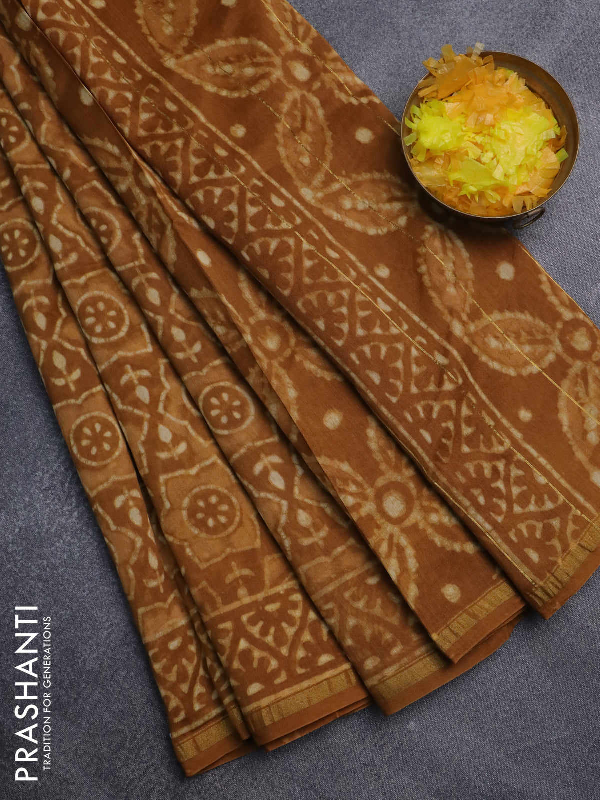 Chanderi bagru saree dark mustard with allover batik prints and small zari woven border