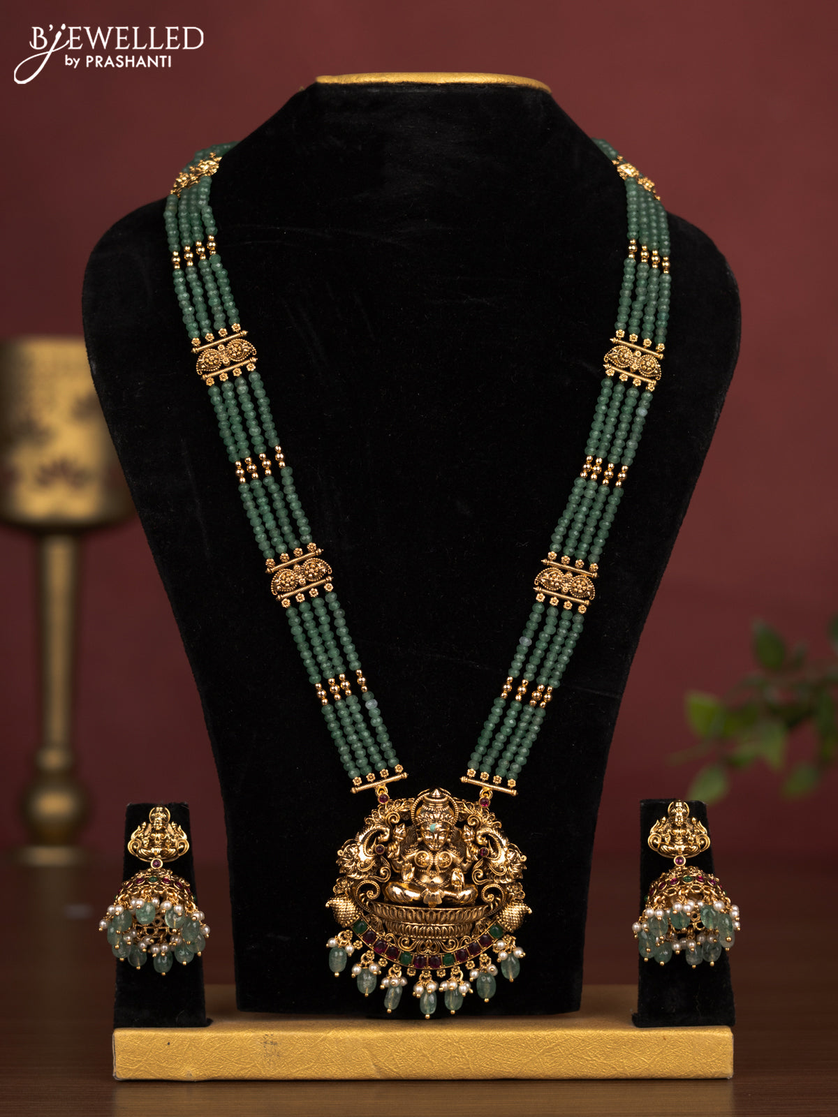 Antique beade haaram lakshmi pendant with kemp stones and pearl & golden beads hanging