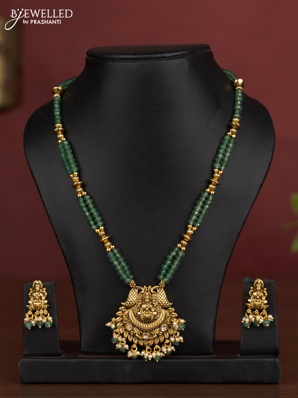 Antique beaded necklace lakshmi pendant with kundan stones and pearl & green beads hanging
