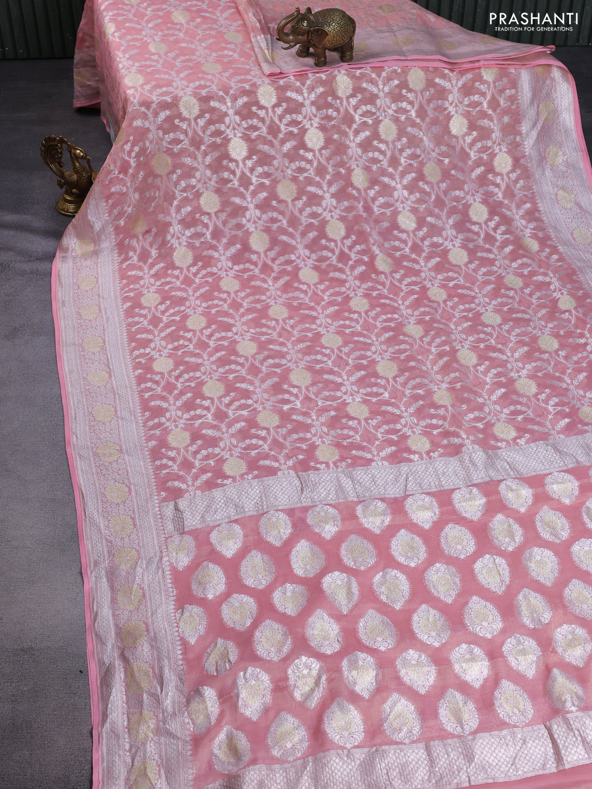 Banarasi georgette tissue saree peach shade with allover thread & silver zari floral weaves and silver woven border