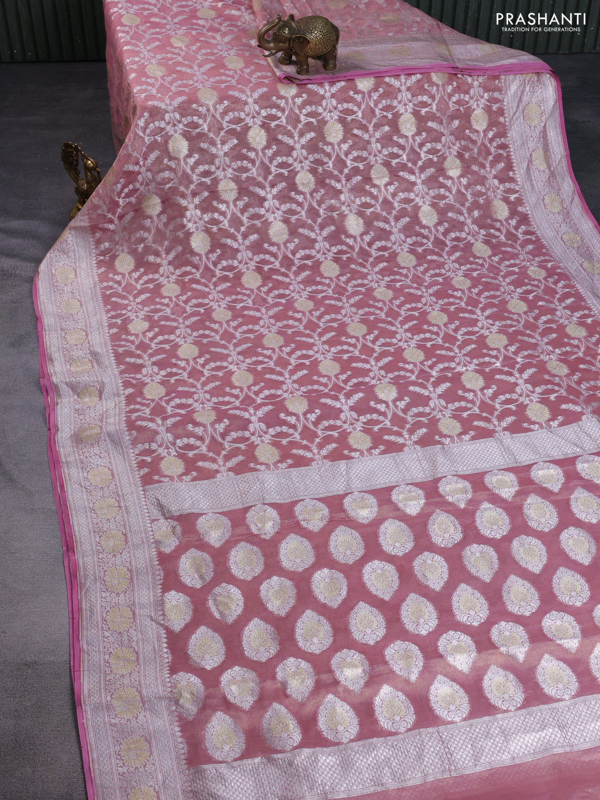 Banarasi georgette tissue saree peach shade with allover thread & silver zari floral weaves and silver woven border