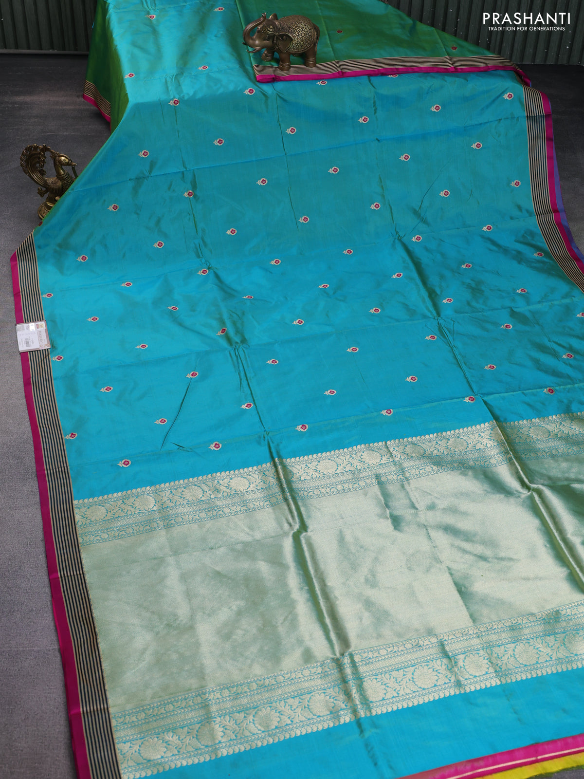 Banarasi katan silk saree dual shade of teal green and pink with zari woven floral buttas and simple border