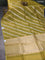 Banarasi organza silk saree mustard green with silver & gold zari weaves and piping border