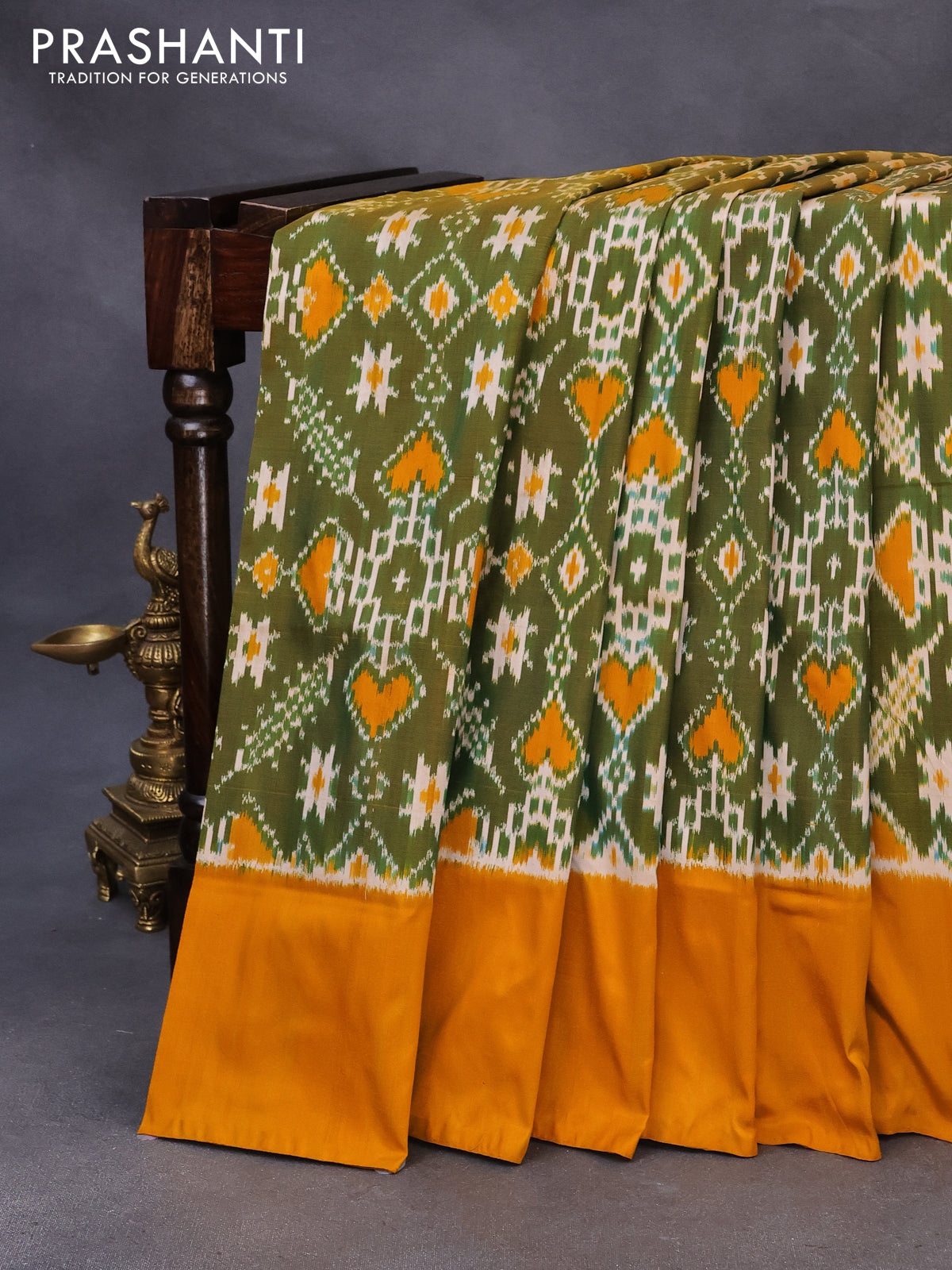 Pochampally silk saree green and mustard yellow with allover ikat weaves and simple border