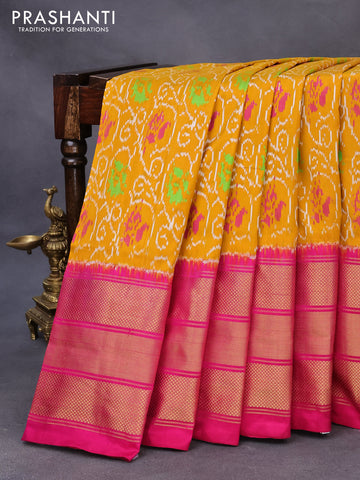 Pochampally silk saree dark mustard yellow and magenta pink with allover ikat weaves and long zari woven border