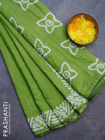 Batik cotton saree light green with allover sequin work & batik butta prints and printed lace work border