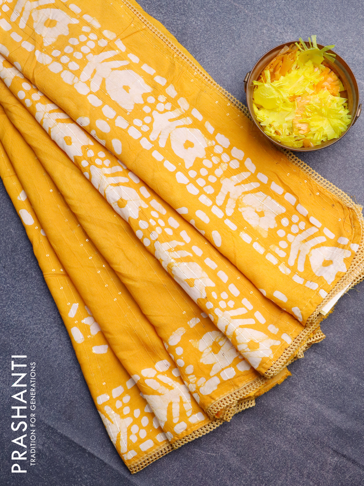 Batik cotton saree yellow with allover sequin work & batik butta prints and printed lace work border