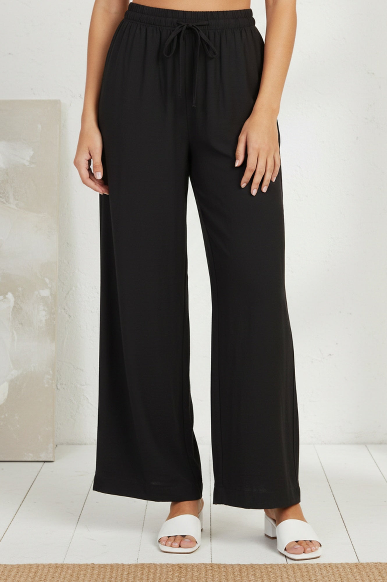 Black Solid Rayon Relaxed Fit Rayon Blend Flared Pants