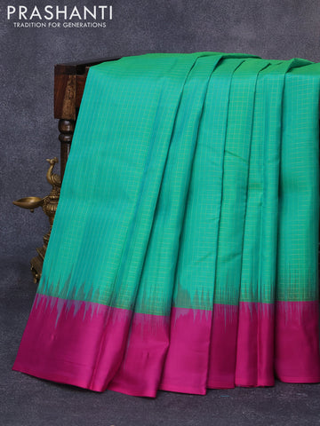 Pure kanjivaram silk saree dual shade of green and purple with allover zari checks pattern and simple border