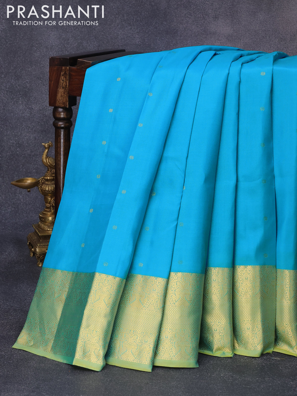 Pure kanjivaram silk saree light blue and dual shade of light green with zari woven floral buttas and rich zari woven border