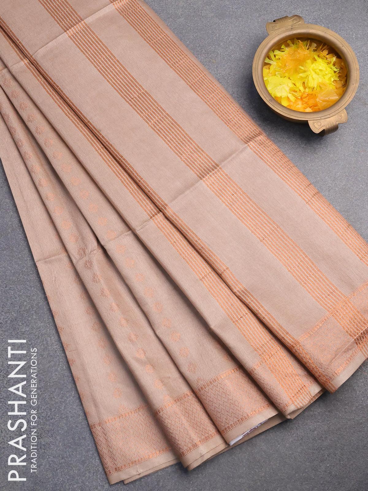 Bamboo silk saree beige with allover copper zari woven butta weaves and zari woven border