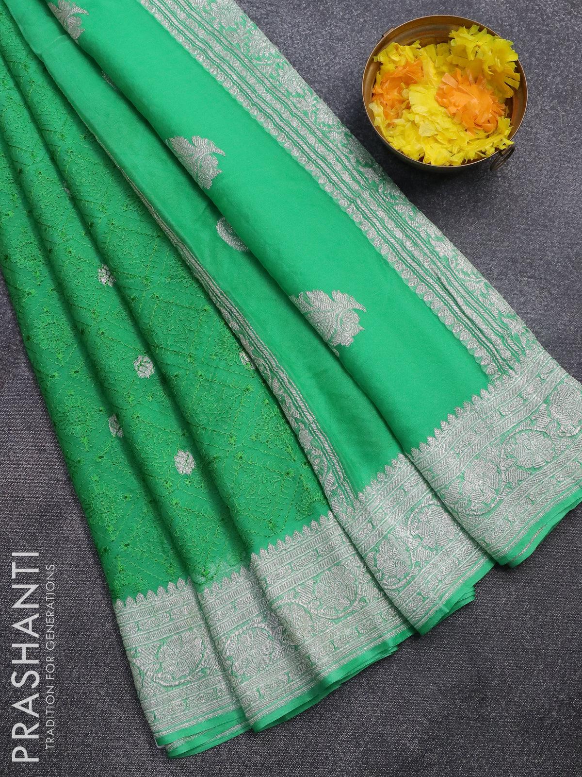 Banarasi chiffon saree green   with allover chikankari work and silver zari woven border