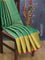 Banarasi kora saree green and yellow with allover zari weaves and long zari woven border