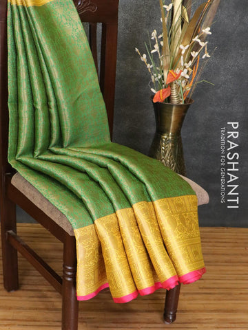 Banarasi kora saree green and yellow with allover zari weaves and zari woven border