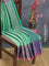 Banarasi kora saree teal green and blue with allover zari checks & buttas and peacock zari woven border