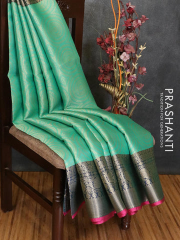 Banarasi kora saree teal green and blue with allover zari weaves and zari woven floral border