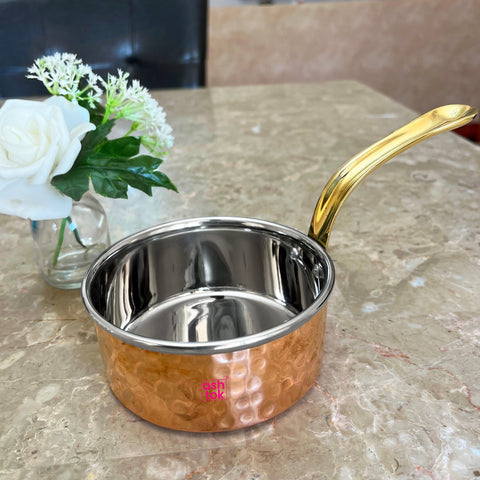 copper saucepan with brass handle