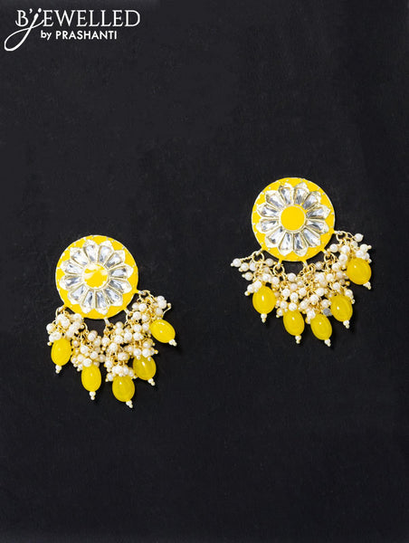 Buy Niscka Traditional Yellow Oxidized Jhumki Earrings online