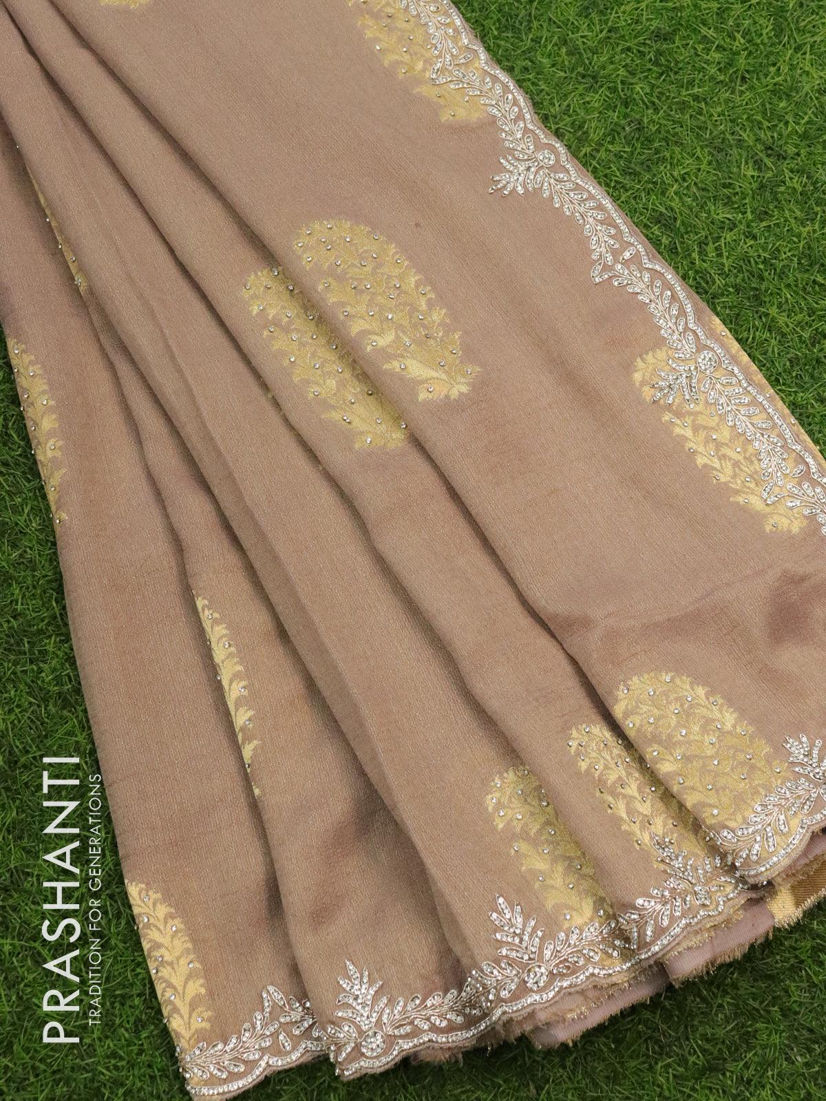 Designer georgette saree brown shade with allover zari buttas & stone work